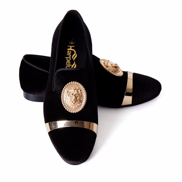 black flat shoes with gold buckle