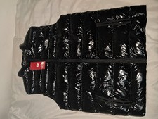 Black armless puffer jacket Nylon Fabric Medium Size Suitable for All