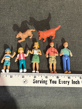 Vintage plastic dollhouse family with movable joints, 7 figures