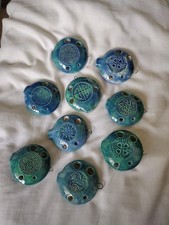 Collection of nine Songstone Ocarina