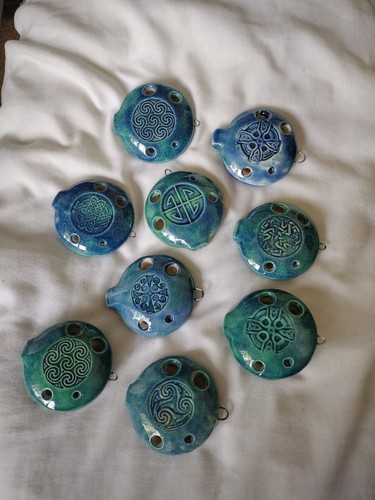 Collection of nine Songstone Ocarina