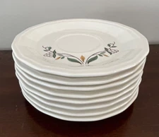 Vintage set of 8 saucers. floral, green, tan, brown on white