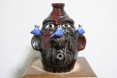 brian wilson (RARE W/ BLUE BIRDS) face jug , folk art 10'' tall x 8'' wide - Image 1 of 4