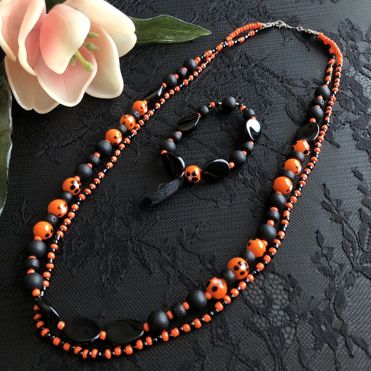 Orange and shop black jewelry