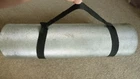 A ROLL MAT CARRY STRAP---- NO MAT INCLUDED