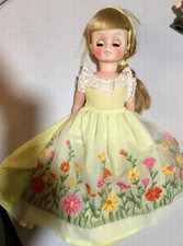 vintage 14 inch Effanbee Doll with yellow flower dress