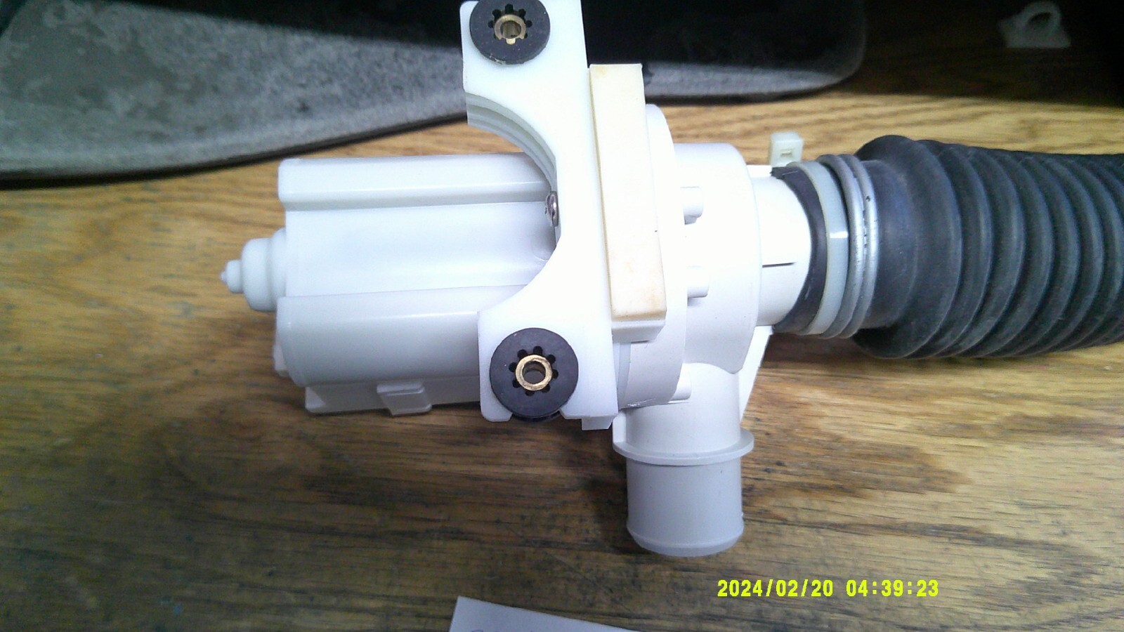 WH23X10040 GE washer water pump Used Good shape tested Hose left on but