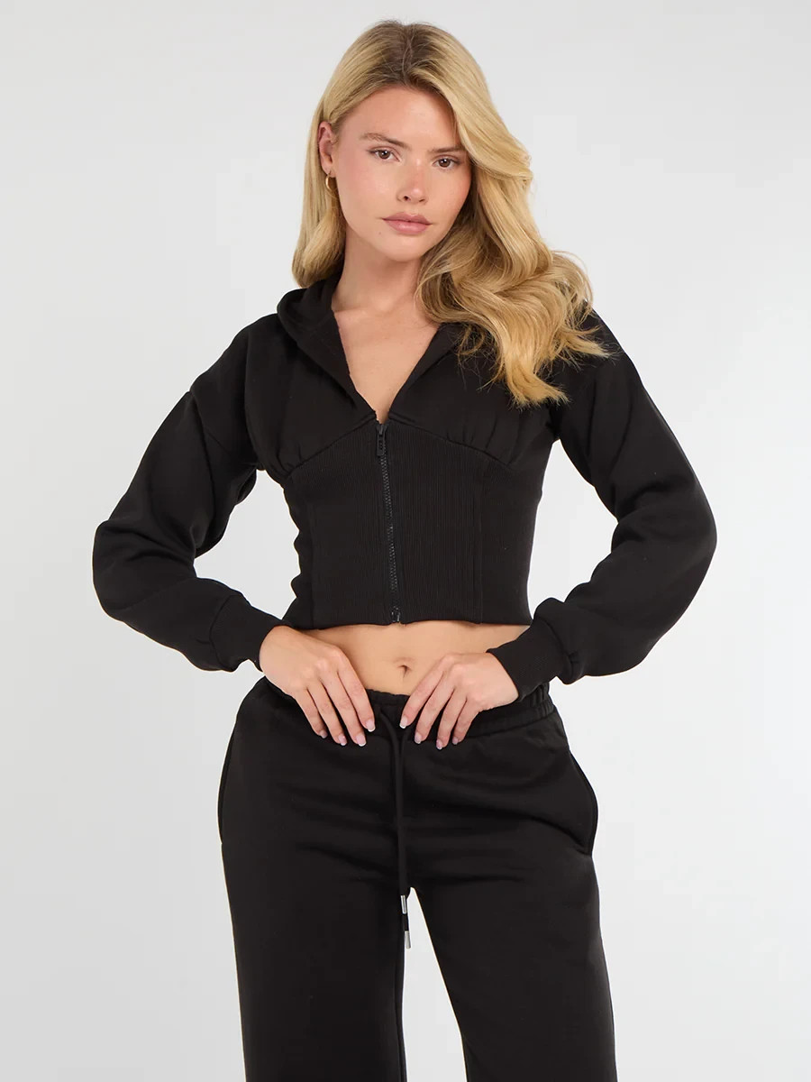 Set tuta donna corsetto cropped foderata in pile zip cappuccio pantaloni jogger foto 6