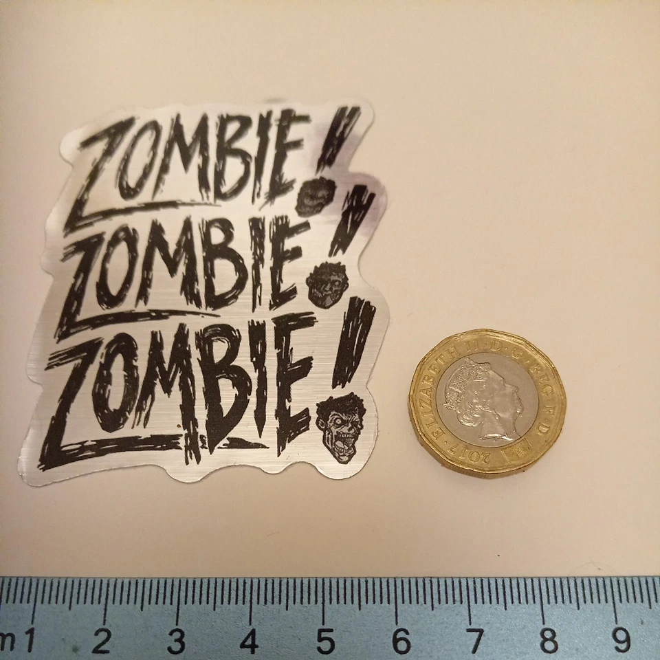 ZOMBIE! repeated 3 times in a distressed font, with three cartoon zombie heads - Image 3 of 4