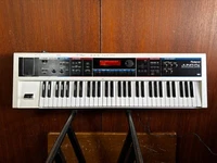 Roland Juno-Di Portable 61-key Mobile Synthesizer White color w/bag power supply
