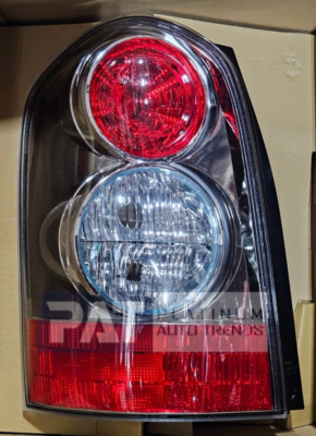 GENUINE MAZDA MPV 04-06 TAIL LAMP ASSY WITH MLDG LH LE46-51-180B