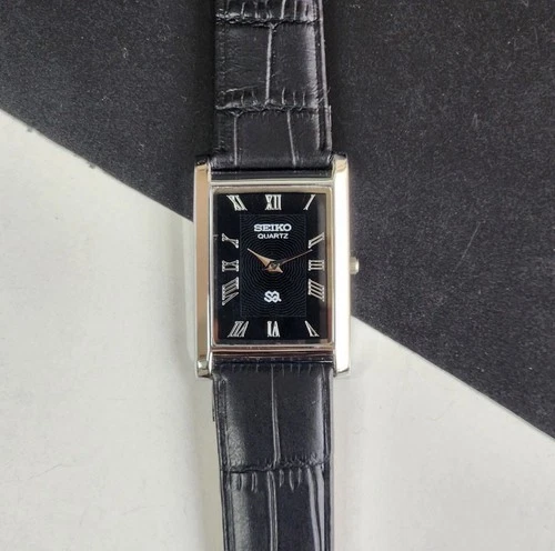 Vintage Seiko Slim Quartz Black Face Gentlemen's Wrist Watch