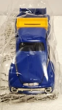 Ertl Collectibles 1951 ford pickup bank With additional parts and tires. New