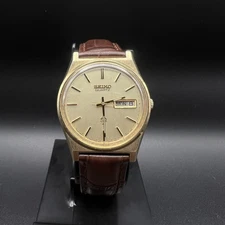 Vintage Seiko Quartz SQ 34mm Mens Watch Gold Tone 7123-8439 New Band & Battery