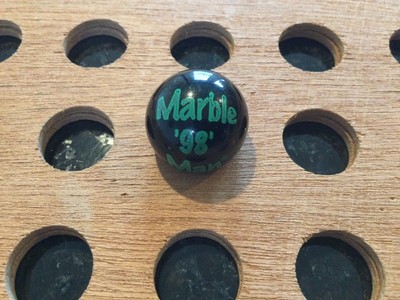 Vintage | ''The Marble Man 1998'' | Green Print on Black Marble