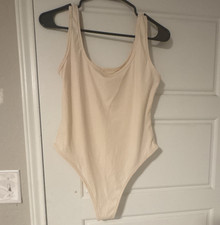 Women s Beige Solid One Piece Bodysuit Size S Mild Body Compression Stretch