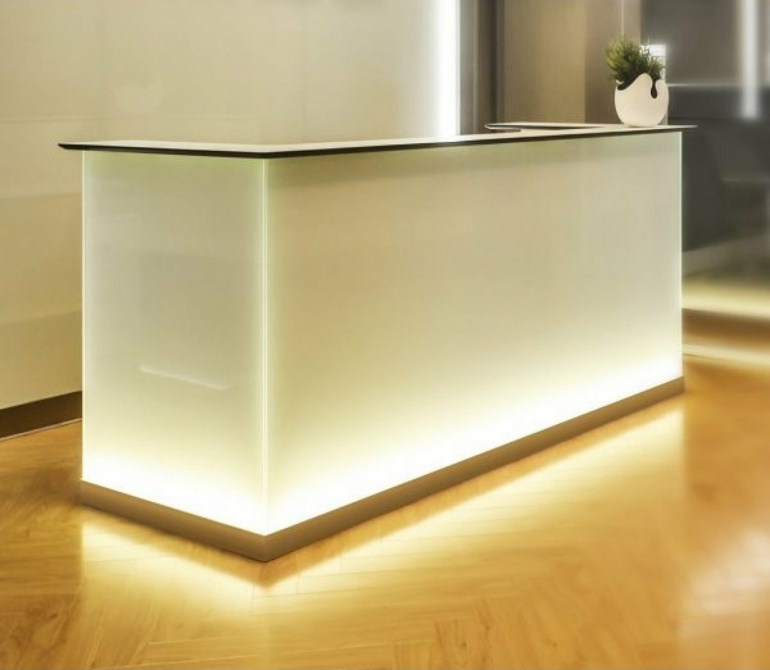 small glass reception desk