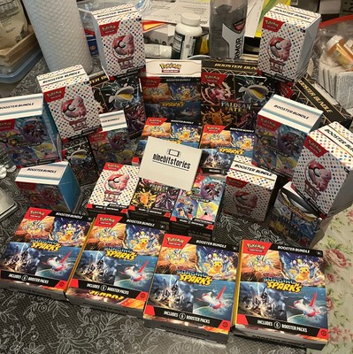 booster box pokemon under $100 100 Prismatic Evolutions Pack Lot TCG SHIPS TODAY New Sealed and Duraludon VMAX towers above the land in its Gigantamax form Pokemon TCG: 100 Gift Box