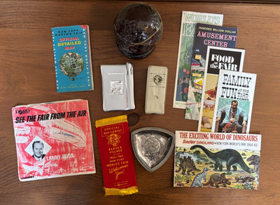 Array of 12 New York World s Fair items- Unisphere Sinclair Alaska Food Fun Map