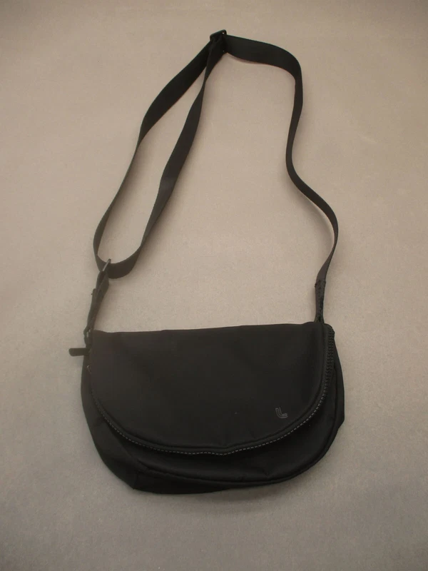 lole back zip pocket snap crossbody 