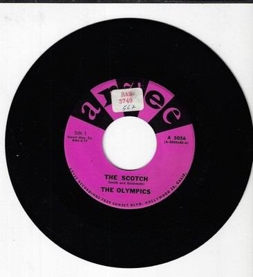 OLYMPICS THE SCOTCH/BABY IT'S HOT USED 45RPM