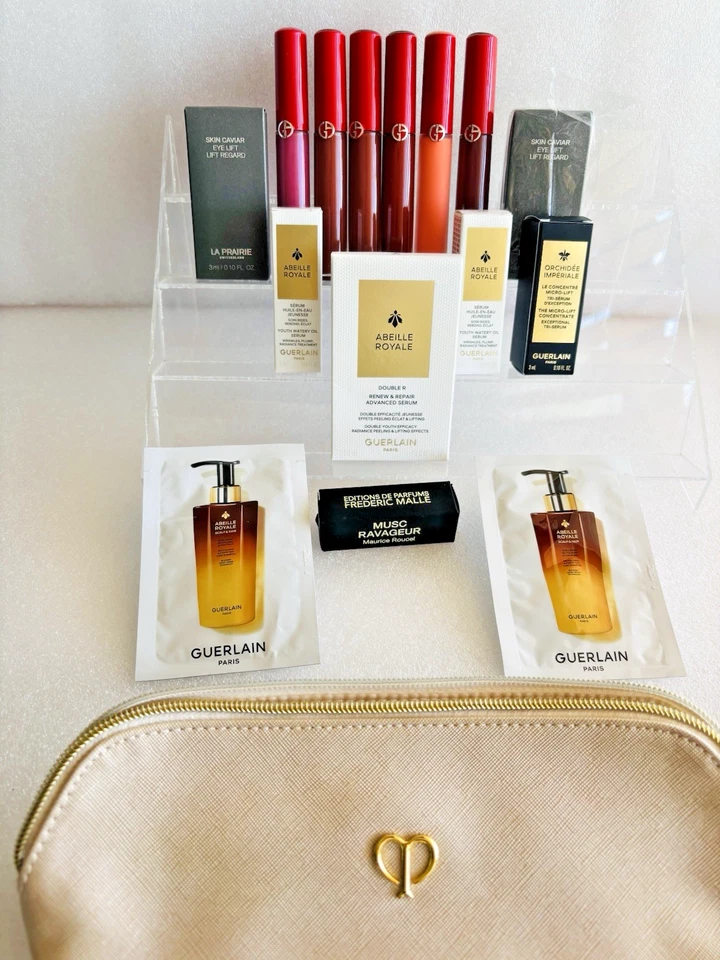 15 MUESTRAS DE COSMÉTICOS LA PRAIRIE GUERLAIN ARMANI DELUXE más BOLSO CLE DE PEAU Foto 2 de 4