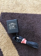  A CANON AC ADAPTER AD-11 III in 120V  60Hz out 6v - 300mA 5W Black Original