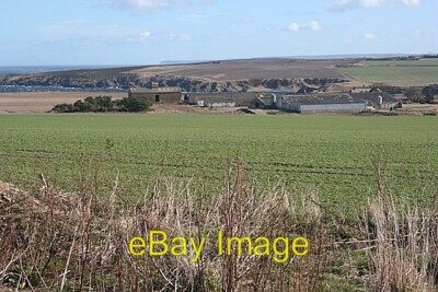 Photo 6x4 Broom Farm Sandend Broom stands above Sandend, the bay of which c2010