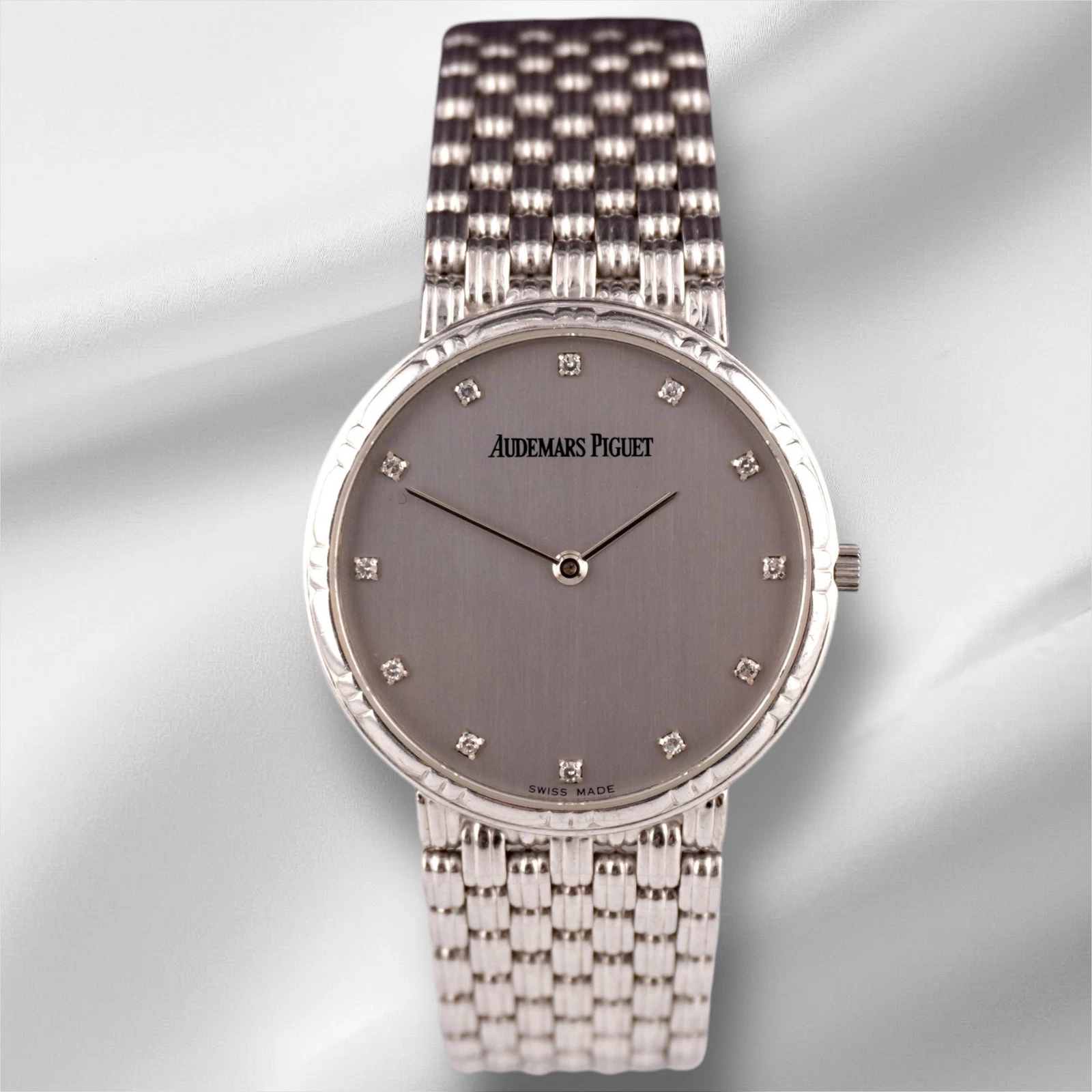Audemars Piguet — Audemars Piguet 31mm 18K White Gold Factory Diamond Silver Dial Watch D38409