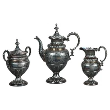 Three Piece Antique Silver Plated Tea Set with Foliate Engraving C1890