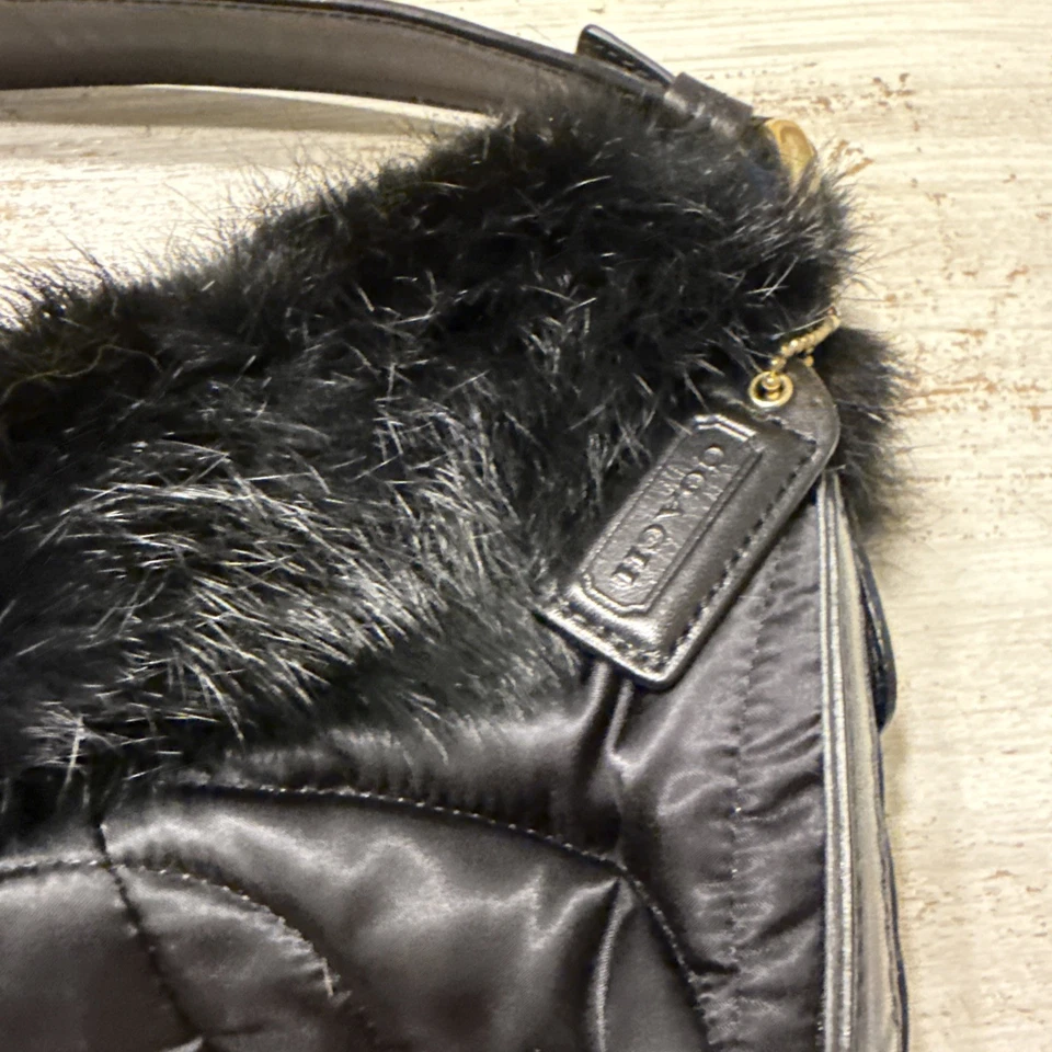 Cartera Coach de piel negra Foto 2 de 4