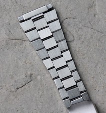 7 Sold Flared flat-link 1960s vintage watch band 16mm-22mm satin SS brick link