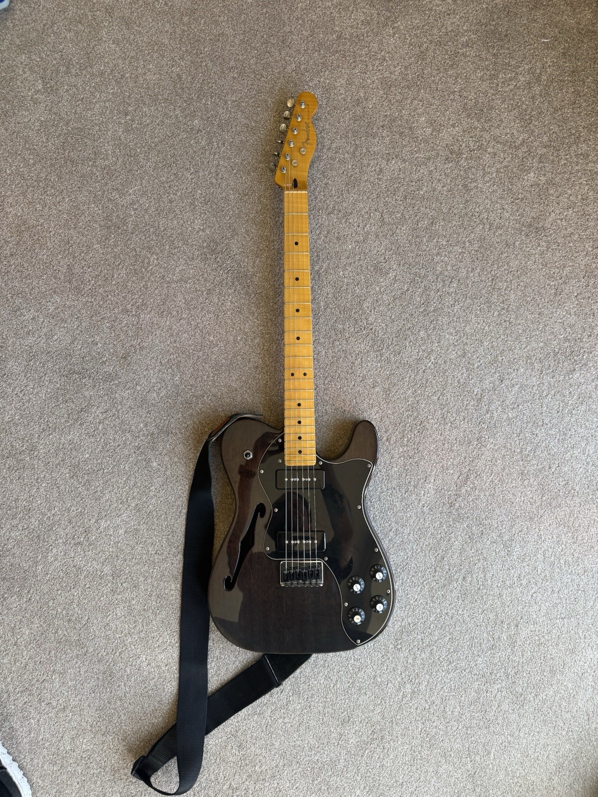 A 2012 Fender Modern Player Telecaster Thinline Deluxe Black Transparent
