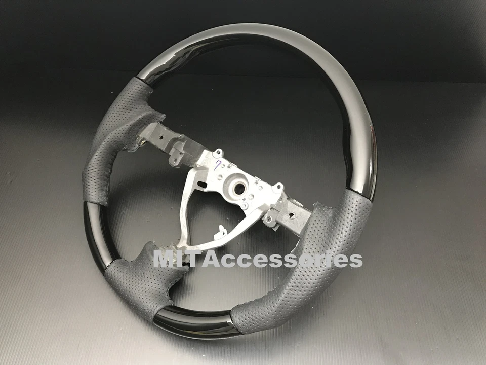 Volante de cuero genuino piano negro deportivo para Toyota FJ Cruiser 2006-2017 Foto 2 de 4