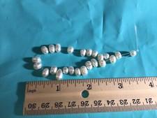 26 loose Cultured Pearls various sizes pre drilled up to 1 inch .