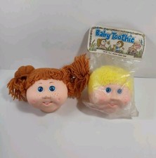 Muñeco toothie bebé vintage haciendo cabezas 1984 hilo amarillo y marrón pelo 4,5"