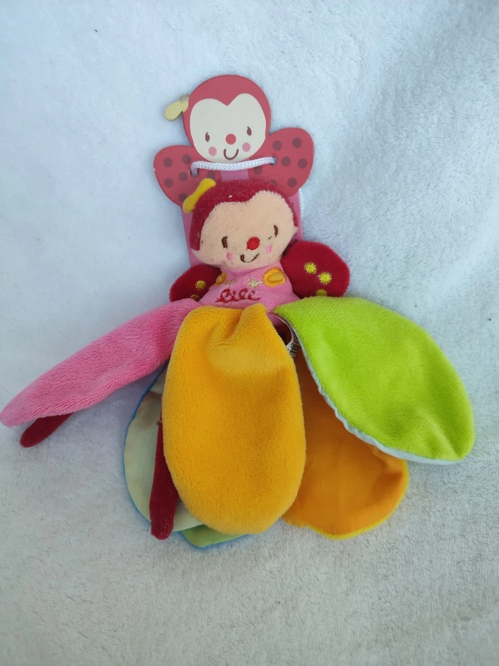 Doudou plat coccinelle lili  jaune vert rouge neuf babynat roumanoff - Photo 1/1