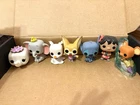 Disney Funko Vinyl. Comes with 7 Figures. All In Good Condition. See Photos