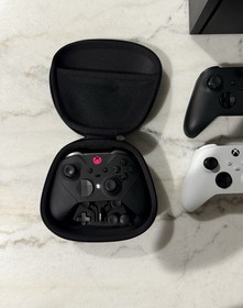 Xbox Series X 1TB with Two Controllers, Xbox Elite Wireless Controller, & Wall M