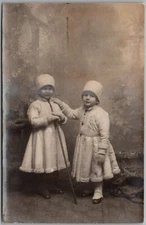 2 Little Girls In White Coats, Hats Studio RPPC Real Photo Postcard B707