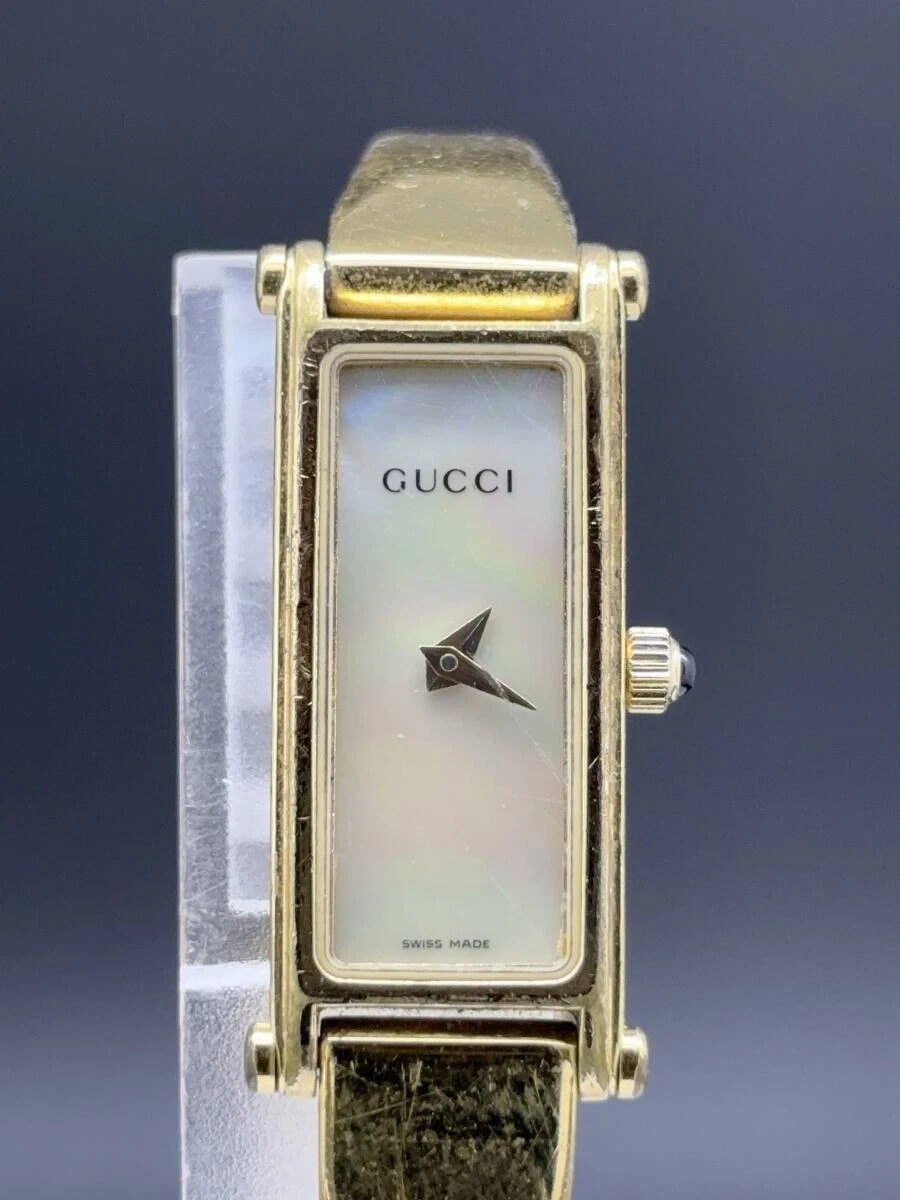 [Exc+4] Montre Gucci 1500L Femme 12mm Cadran Or Rectangle Quartz Occasion Fonctionne