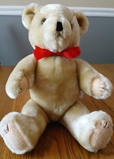 12" Tan Cream colored Teddy Bear With Red Bow weight is 13.4 oz. unsure of Brand