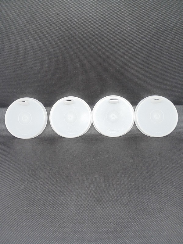 Four  Tupperware Lids Only 1552
