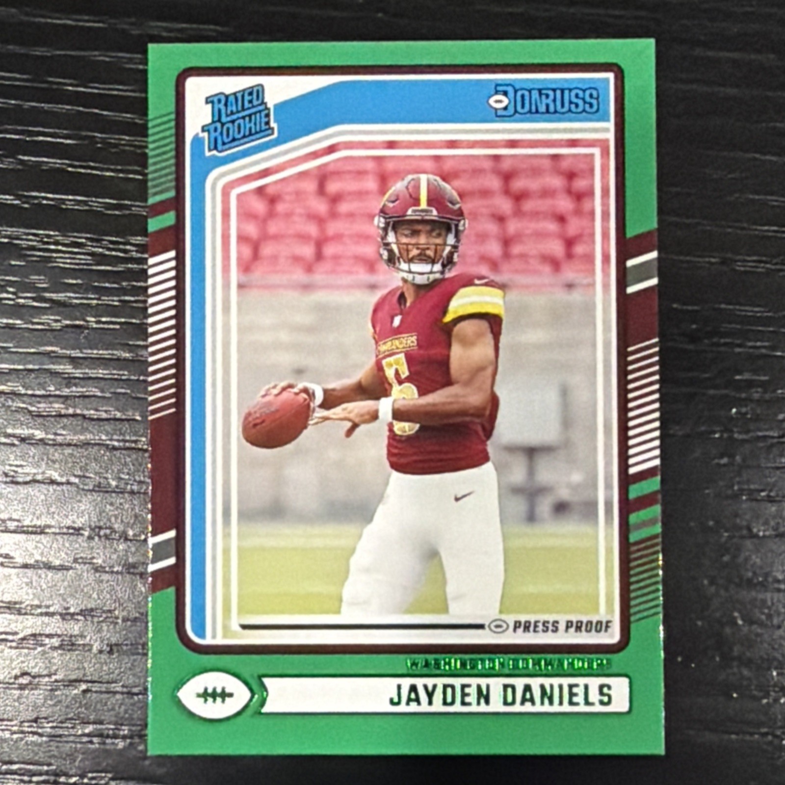2024 Donruss Jayden Daniels Press Proof Green Rated Rookie #389 Commanders