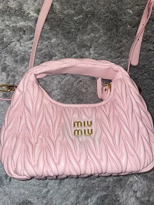Sac Miu Miu rose avec lance  - Photo 1/4