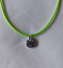 Hello Kitty Small Silver Tone Pendant on 18+ Inch Green Cord Necklace 