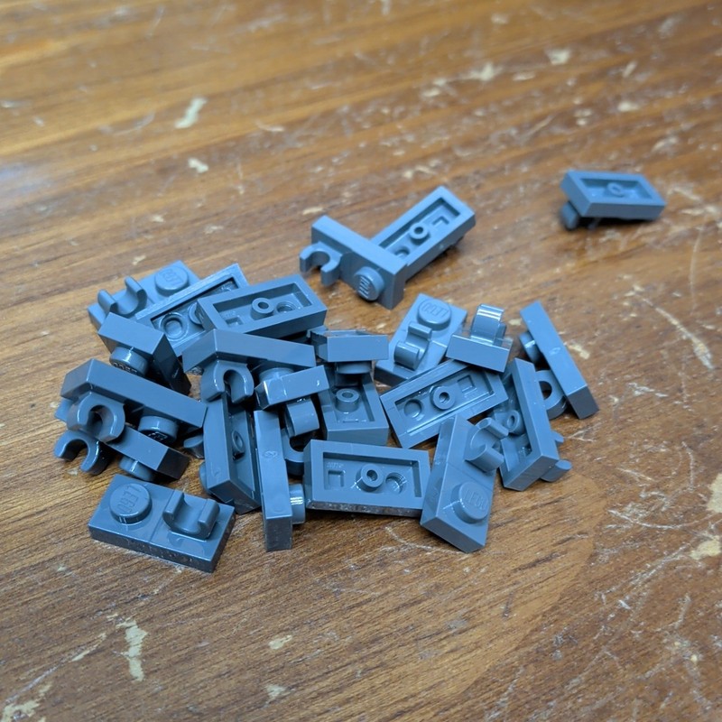 Lego Dark Bluish Gray Plate, Modified 1 x 2 with Open O Clip on Top - Qty 24