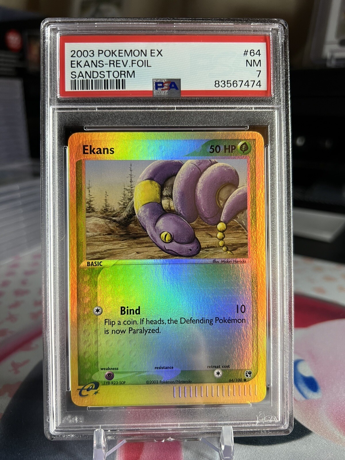 2003 Pokémon EX Sandstorm EKANS 64/100 REVERSE-FOIL TCG GRADED PSA 7