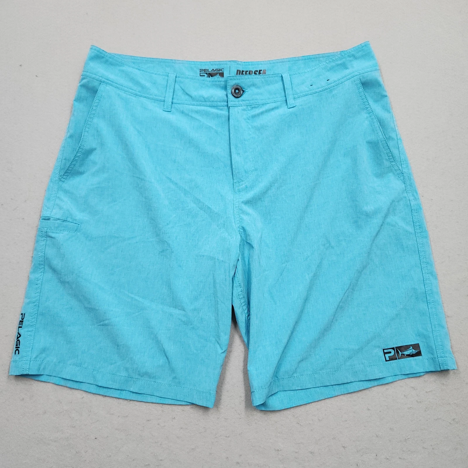 Pelagic Shorts Mens 40 Blue Deep Sea Hybrid Performance Fishing Board Shorts
Opens in a new window o