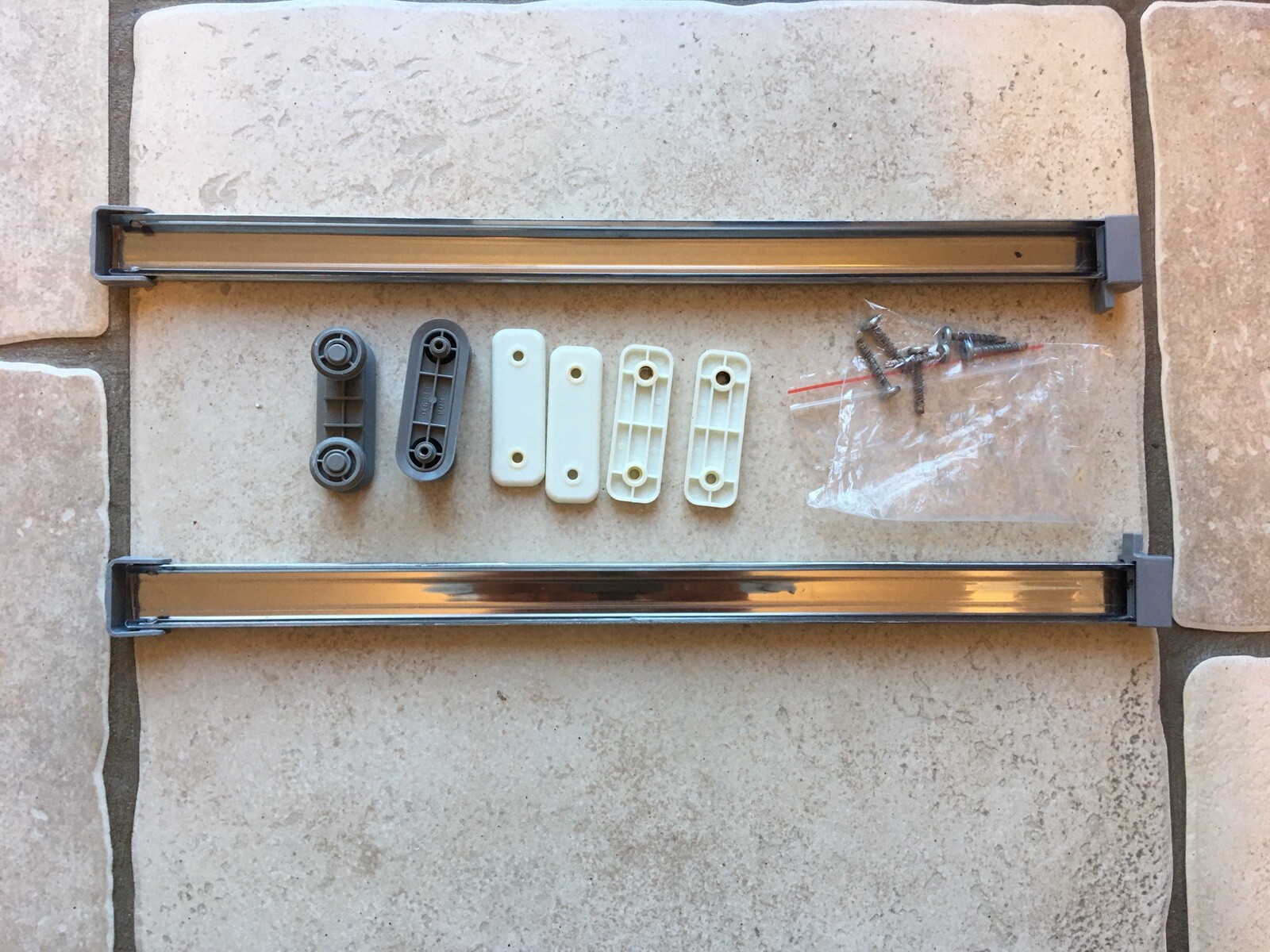 Hotpoint dishwasher upper basket rail support wheels and stop J00611139